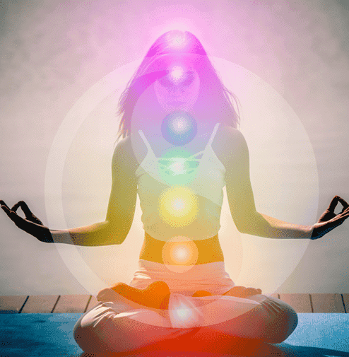 A person practising stillness in a peaceful garden