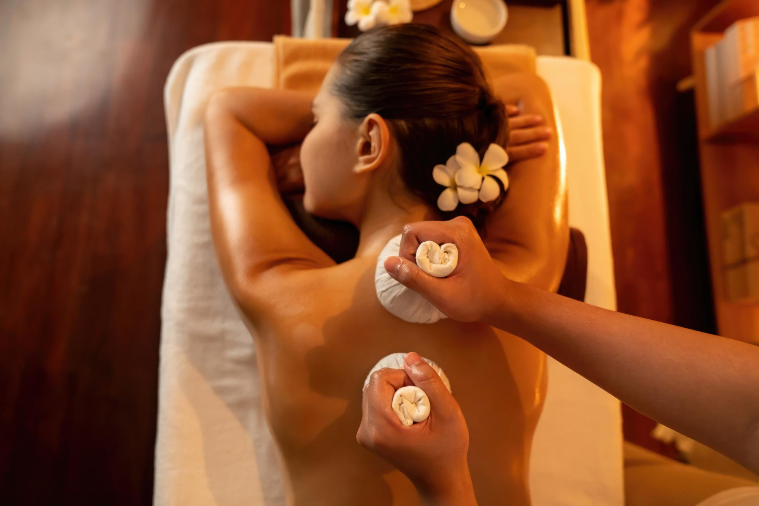 Abhyanga oil massage with warm herbal powder PodhiKizhi bolus bags